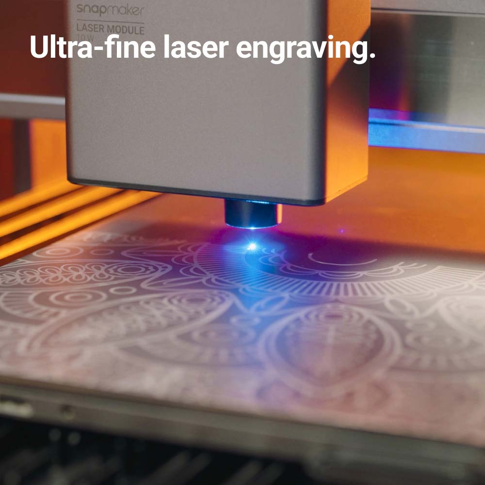 L'incisore laser ad alta potenza Snapmaker all'opera su disegni complessi, a dimostrazione della sua capacità di eseguire incisioni laser ultra-precise.