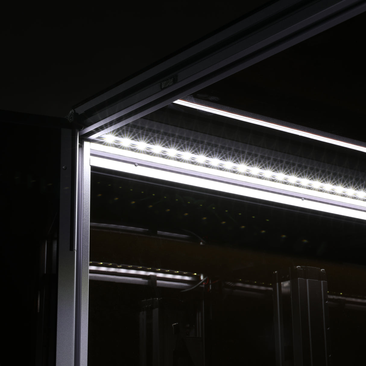 Close-up of the built-in LED lights in the Snapmaker 3D printer enclosure, providing optimal illumination for the printing process.