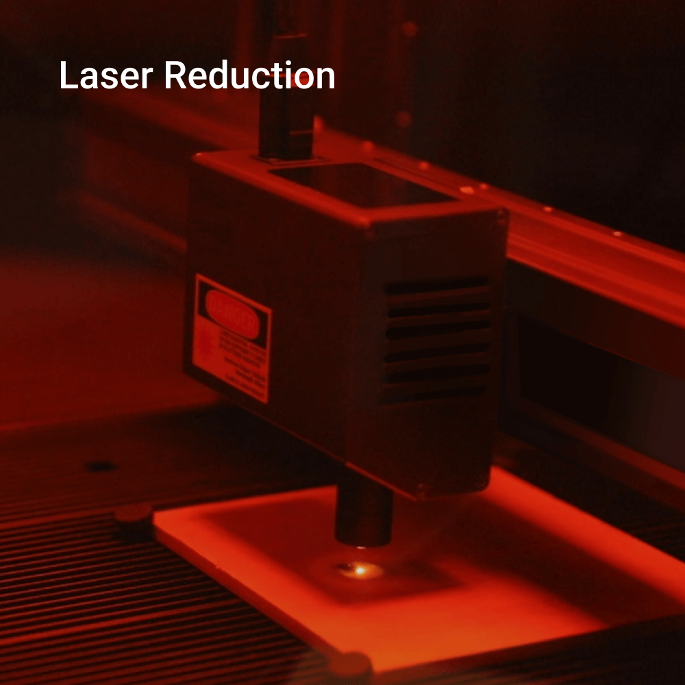 Snapmaker 3D printer enclosure with laser reduction feature to ensure safety during printing and engraving processes.