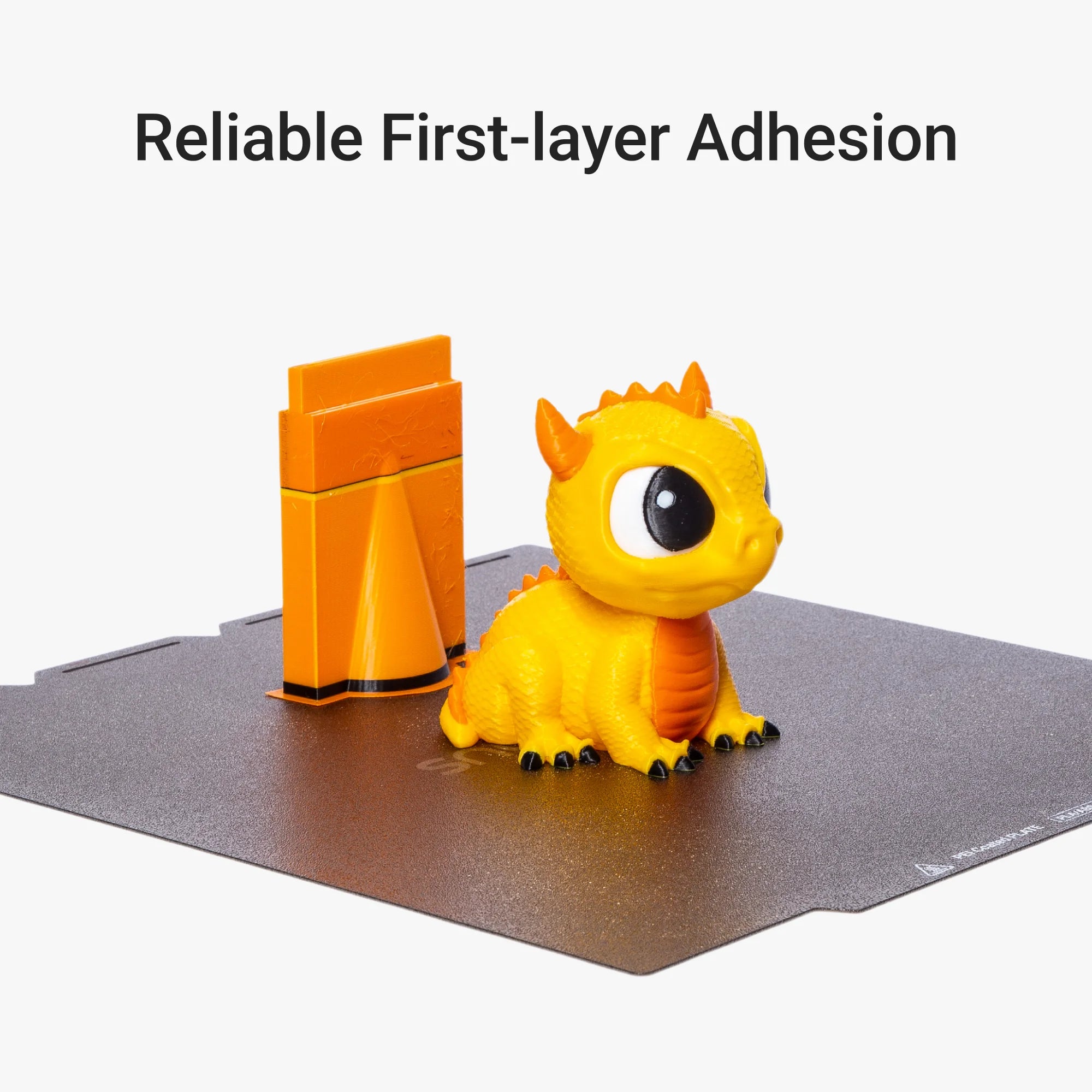 Textured PEI Steel Plate for Snapmaker U1 holds two colorful prints securely, demonstrating reliable first-layer adhesion.