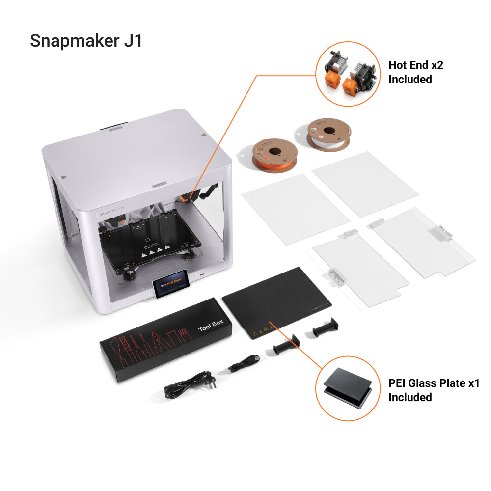 Included accessories of Snapmaker J1 : two hot ends, PEI glass plate, assorted tools, and filament spools.