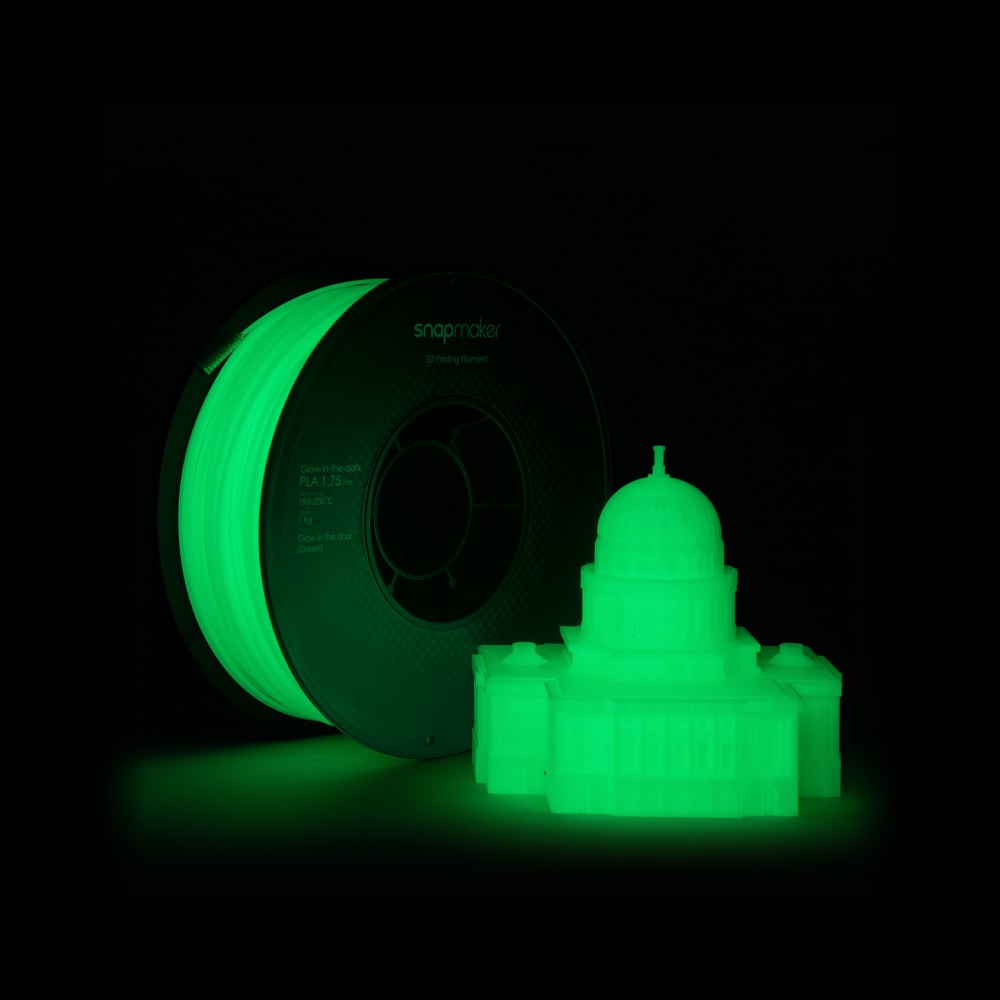 Snapmaker-PLA-Filament in leuchtendem Grün, mit dem ein leuchtendes, 3D-gedrucktes Architekturmodell entsteht.