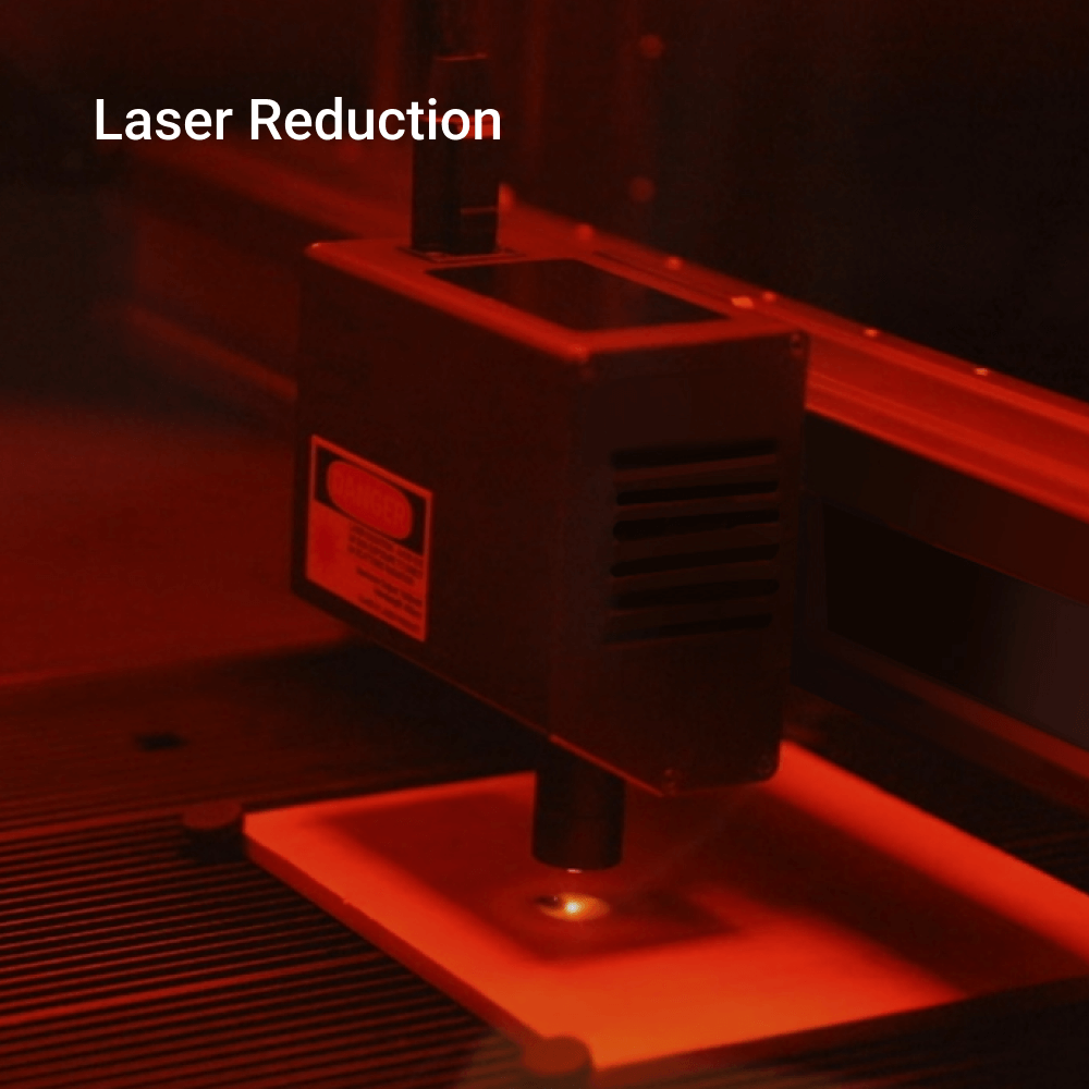 Snapmaker 2.0 laser module in operation, highlighting laser reduction capabilities for precision and safety.